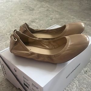 Cole Haan nude flats with bow decoration on back